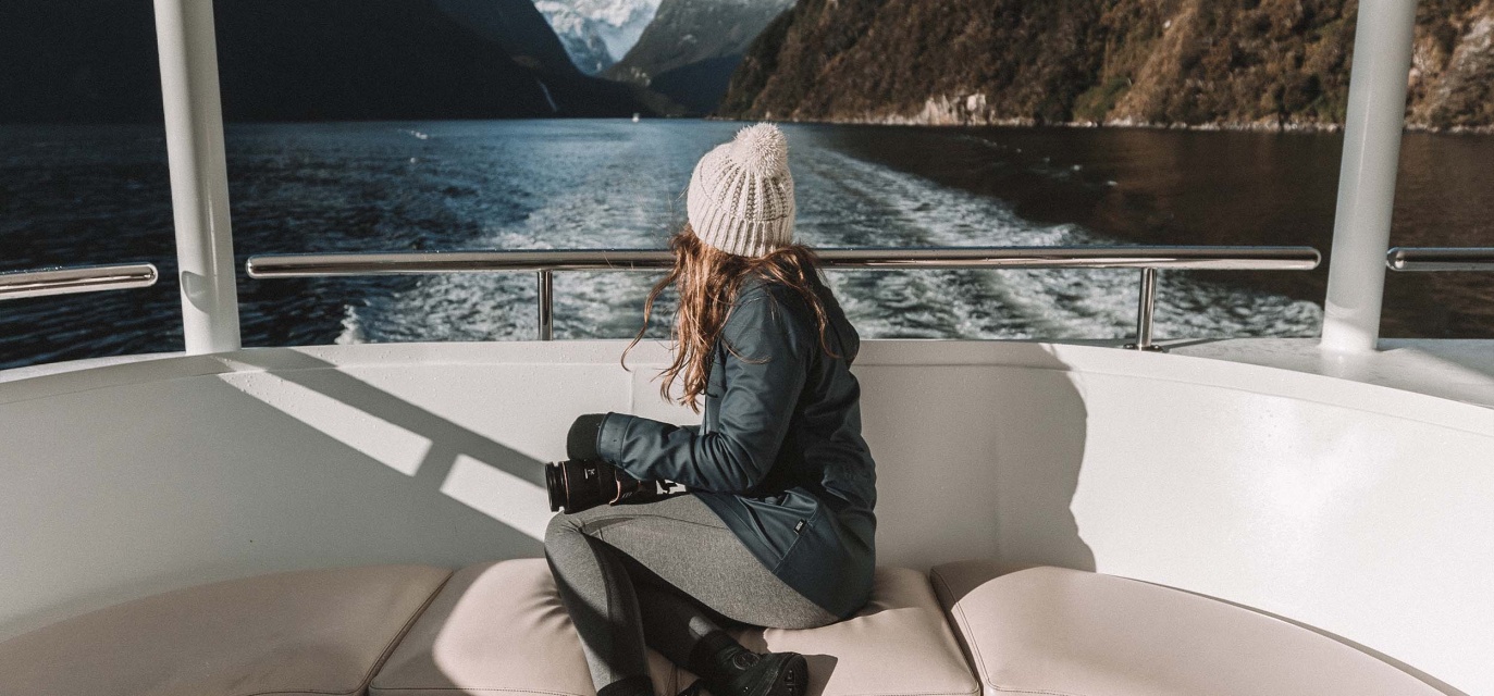 Enjoying the views of the cruise from one of the best seats in the house; the covered rear deck on the Gem of the Sound